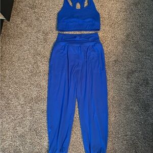 Blue High-Waisted Track Pants with Tapered Ankles and matching sports bra